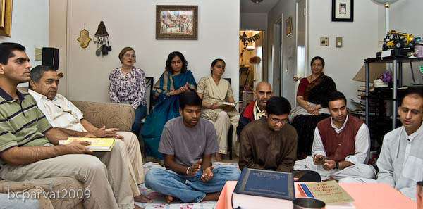 Devotees and friends gathered in the home of Jairam Prabhu